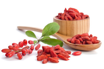 berberries and goji berries isolated on white background