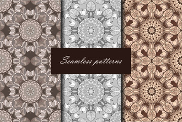 Set with three seamless patterns. Decorative patterns with mandalas in gray colors. Vector backgrounds