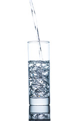 Drinking water is poured into a glass
