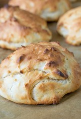 Traditional British homemade plain scones on a baking tray
