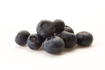 some blueberries on a white background