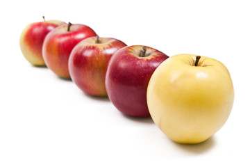 Group of ripe apples on a white background