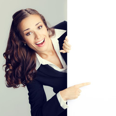 Businesswoman showing signboard