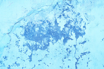 Wall fragment with scratches and cracks