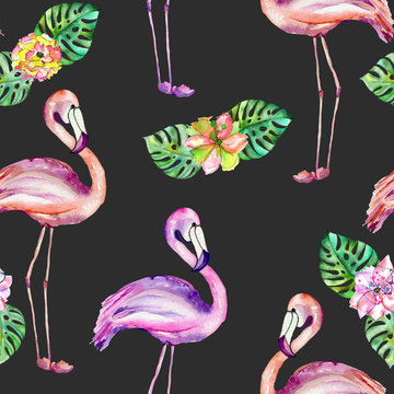 Seamless pattern with the flamingo and exotic flowers, hand painted in watercolor on a dark background
