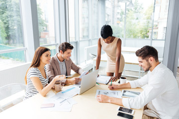 Fototapeta premium Business people discussing financial report and new project in office