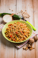 barley risotto with zucchinis chickpeas nuts and tomatoes