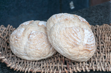 Artisan bread in the basket, selective focus