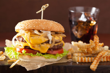 double cheeseburger with tomato and onion © Olga Miltsova