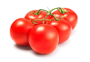 Bunch of fresh cherry tomatoes isolated on white background