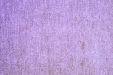 close up surface/pattern of light purple canvas with dark stain. background texture