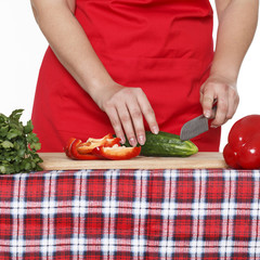 Woman's hands cutting vegetables