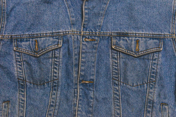 Fototapeta premium Denim jacket with pocket. Close up texture background