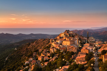 Late evening sunshine on mountain village of Speloncato in Corsi