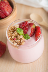 Healthy Strawberry yogurt with fresh strawberries.