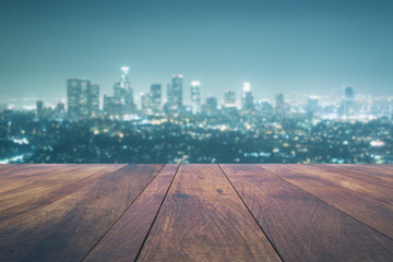 Empty table on night city background
