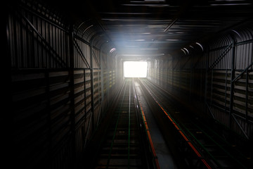 Light at way out or exit rail or track lane in tunnel