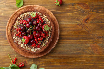 Tart with fruits top view