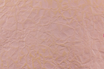 Old pink wrinkled paper