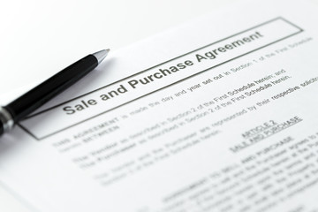 Fototapeta na wymiar Sale and purchase agreement