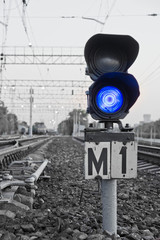 blue semaphore signal on the railway