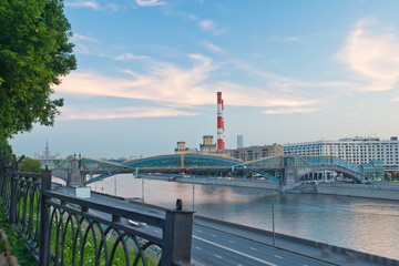 glass bridge over the river in the city