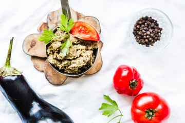 Traditional arabian eggplant dip baba ganoush in a metal bowl