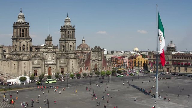 zocalo with the cathedral and giant flag