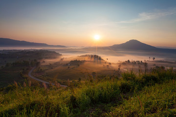 Misty morning sunrise in Khao Takhian Ngo View Point at Khao-kho