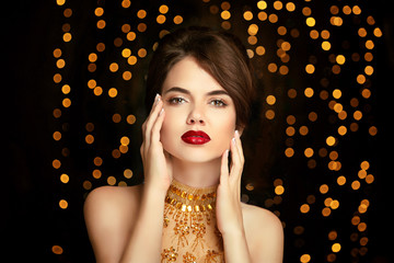 Beauty girl makeup. Fashion jewelry. Elegant lady in golden dres