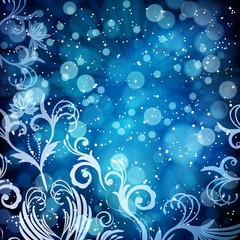 Abstract floral pattern on a blue background.