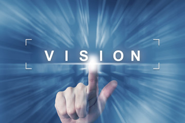 hand clicking on business vision button