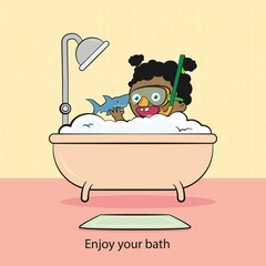 Child playing with a shark in the bathtube