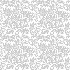 Seamless pattern. Tracery of gray floral abstract element on a white background. Vintage style. The pattern can be used for printing on textiles, wallpaper, packaging