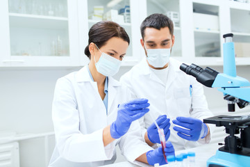 young scientists making test or research in lab