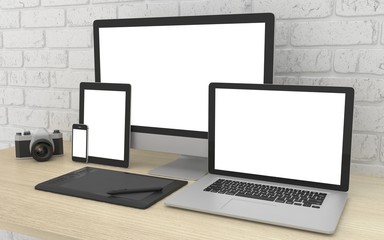 Responsive mockup screen. Monitor, laptop, tablet, phone on table in office. 3d rendering.