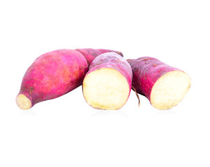 Fresh purple yams isolated on a white background.