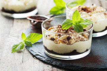 Sweet homemade dessert with cream and chocolate