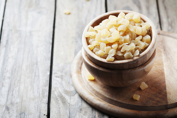 Dried spicy ginger on the wooden table