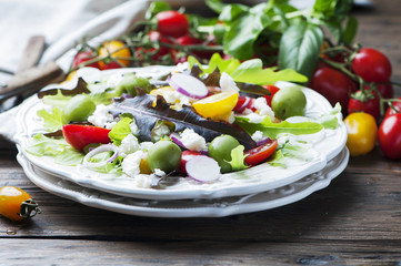 Healthy greek salad with feta and olive