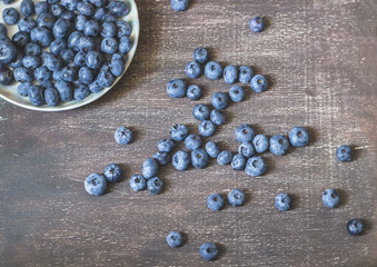 Blueberries on wooden background