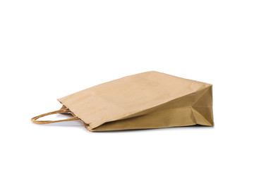 Blank brown paper bag isolated on white background