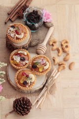 Fototapeta premium Mini almond nuts,fruit tart is delicious.