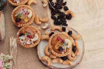 Obraz na płótnie Canvas Mini almond nuts,fruit tart is delicious.