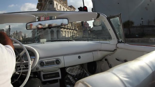 streets of havana cuba from a classic car