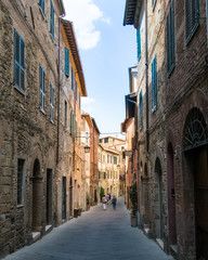Narrow street in Montalcino, Tuscany - 117834835