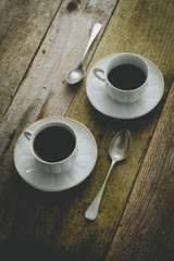 Black coffee on rustic table
