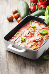 Italian traditional parmigiana with zucchini