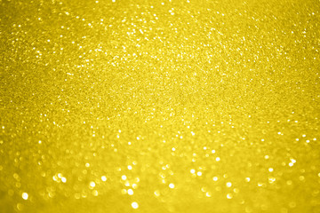 Abstract bokeh background in gold color