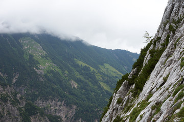 Steep slope of Wilder Kaiser in Austria / Mountaineering to the top of the Alps 